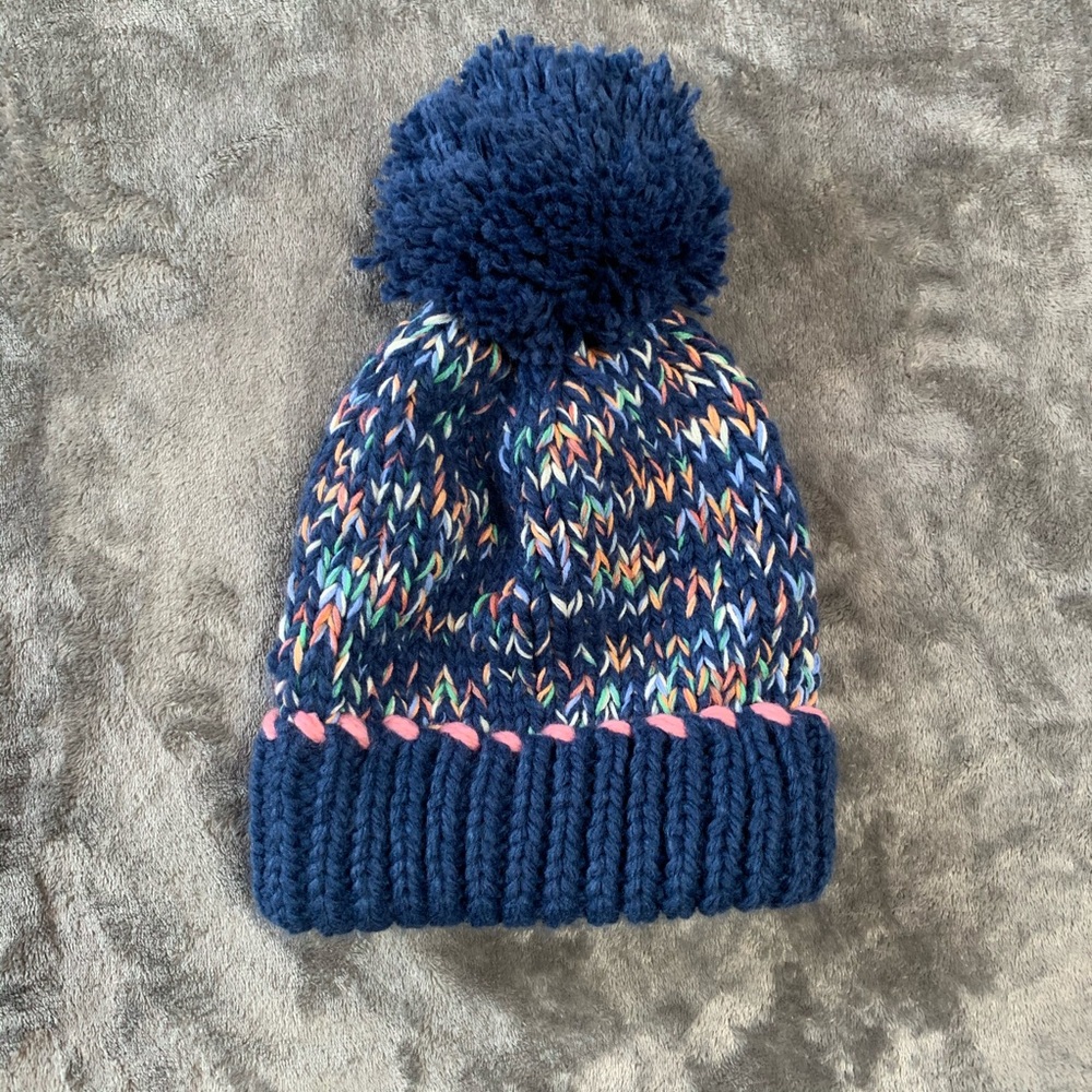 Cara New York pom pom hat